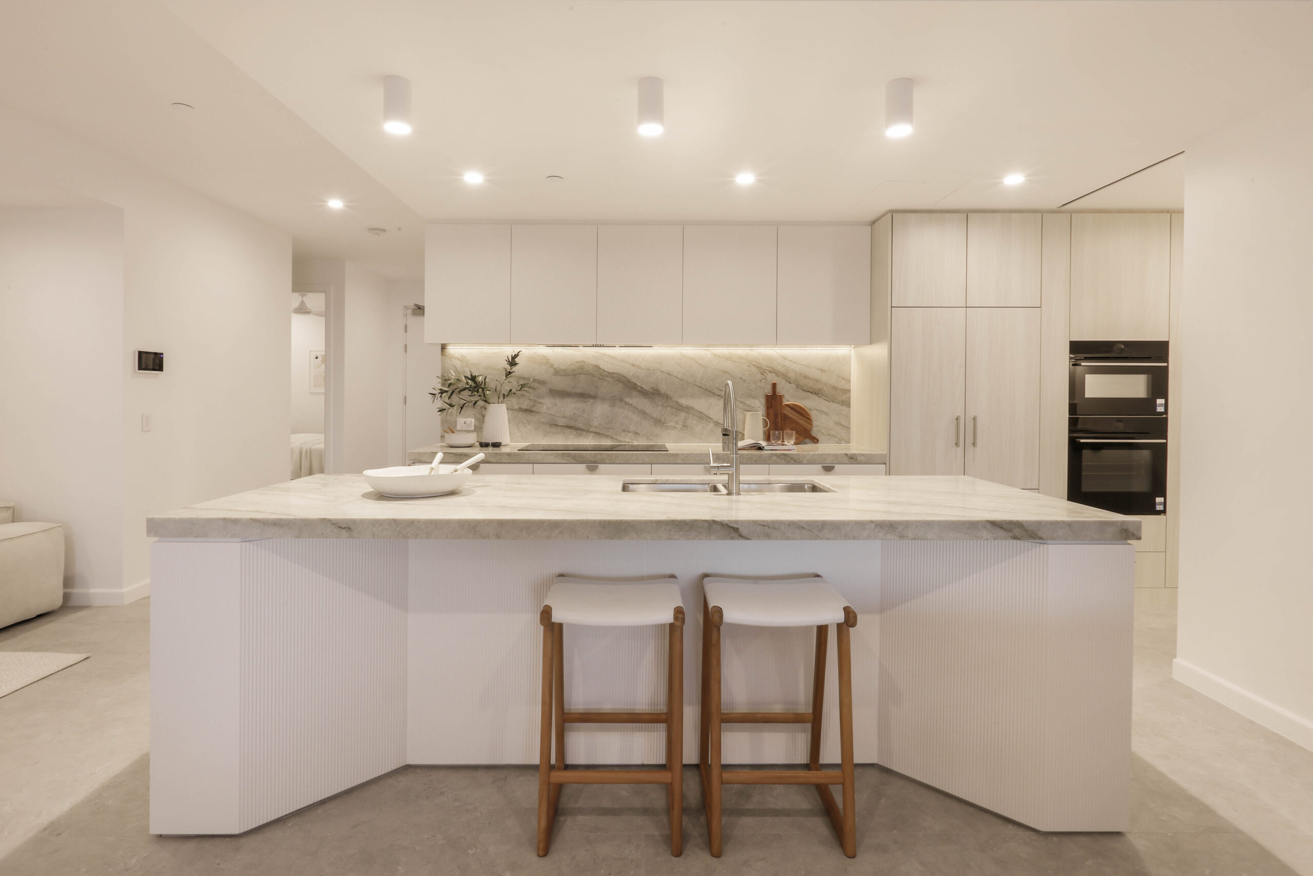 white contemporary kitchen with minimal accessories, property styling by blink living